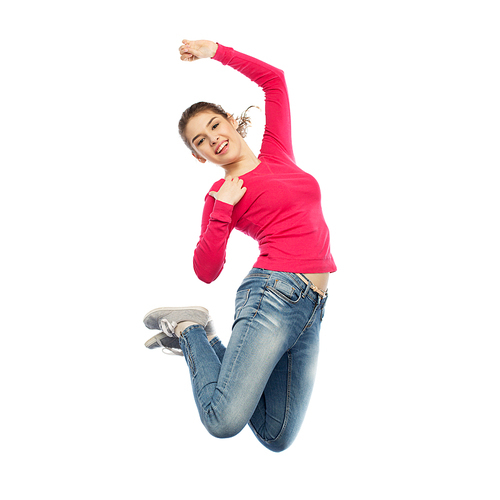 happiness, freedom, motion and people concept - smiling young woman jumping in air over white background