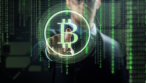 cryptocurrency, finance and business concept - close up of businessman with virtual bitcoin symbol hologram over and binary code and black background
