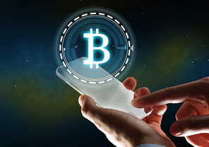 business, cryptocurrency and future technology concept - close up of businessman with transparent tablet pc computer and virtual bitcoin symbol hologram over space background