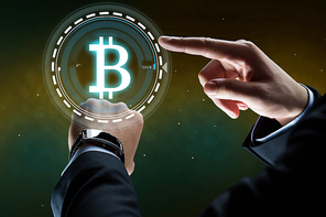 business, cryptocurrency and future technology concept - close up of businessman hands with smart watch and bitcoin hologram over space background