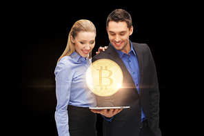 business, cryptocurrency and future technology concept - businessman and businesswoman with tablet pc computer and virtual bitcoin hologram over black background