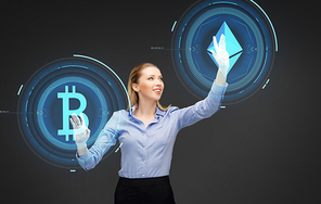 cryptocurrency, financial technology and business concept - businesswoman with ethereum and bitcoin holograms over gray background