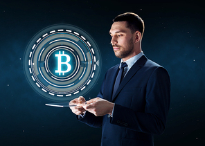 business, cryptocurrency and future technology concept - businessman with transparent tablet pc computer and virtual bitcoin symbol hologram over space background