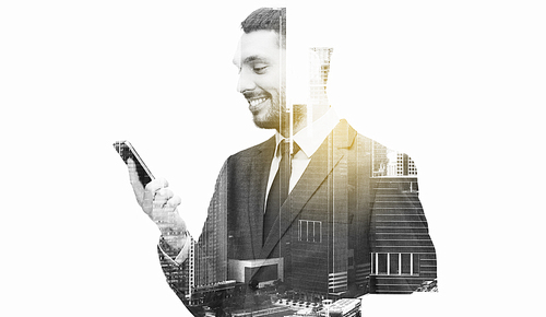 business, technology and people concept - smiling businessman texting on smartphone over city buildings and double exposure effect