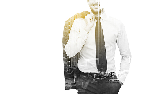 business, people and corporate concept - handsome businessman with crossed arms over city buildings and double exposure effect