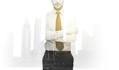 business, people and corporate concept - handsome businessman with crossed arms over city buildings and double exposure effect