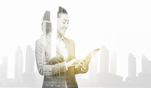 business, people and technology concept - smiling african american businesswoman with tablet pc computer over city buildings and double exposure effect