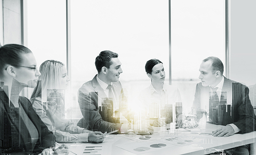 business, teamwork and people concept - team at office meeting over city buildings and double exposure effect