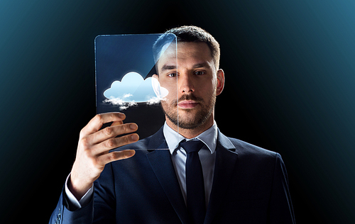 business, augmented reality and future technology concept - businessman in suit working with transparent tablet pc computer over black background