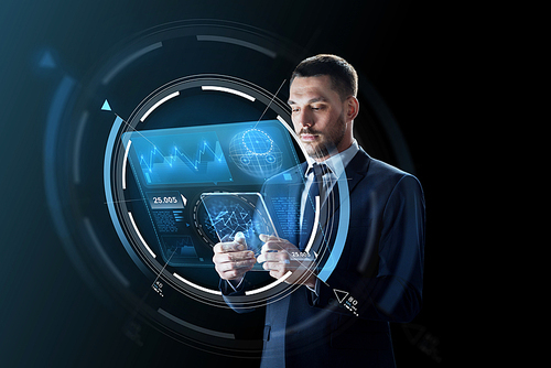 business, augmented reality and future technology concept - businessman in suit working with transparent tablet pc computer and virtual screens projections over black background
