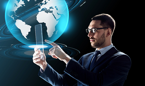 business, augmented reality and future technology concept - businessman in glasses working with transparent tablet pc computer and virtual earth globe hologram over black background