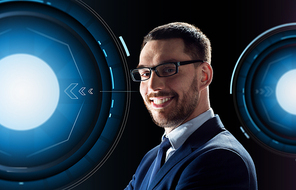 business, people and technology concept - smiling businessman in glasses over black background with holograms