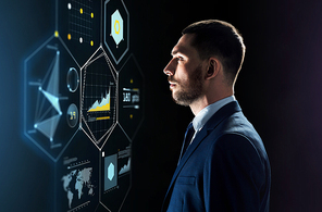 business, people and technology concept - businessman in suit looking at virtual projection over black background