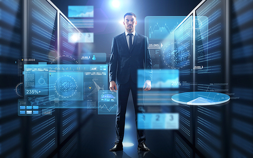 business, people and technology concept - businessman in suit with charts on virtual screen over server room background