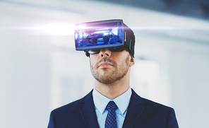 business, technology, augmented and virtual reality concept - businessman with some machine on display of vr headset at office