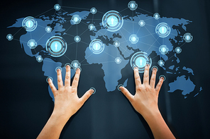 network, technology and communication concept - hands using interactive panel with virtual contacts icons and world map