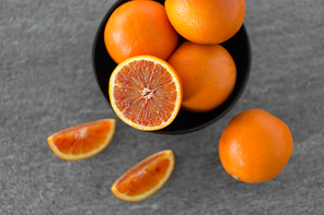 food, fruits and healthy eating concept -close up of fresh juicy blood oranges