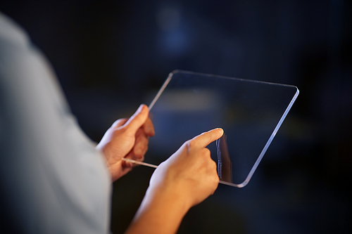 business, people and technology concept - close up of hands with transparent tablet pc computer