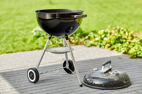 bbq and grilling concept - grill brazier outdoors