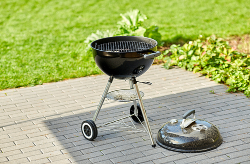 bbq and grilling concept - grill brazier outdoors
