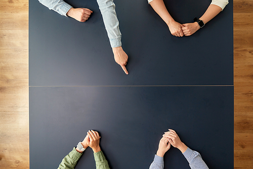 business, people and team work concept - hands of women sitting at office table