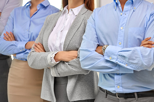 business and people concept - close up of businesspeople at office