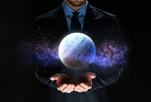 business, astronomy, augmented reality and people concept - close up of businessman with virtual planet hologram