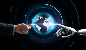 future technology, business and artificial intelligence concept - close up of businessman and robot hand touching virtual earth hologram over black background