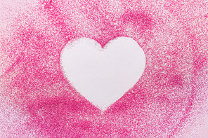 love and valentine's day concept - heart shape on pink glitters on white background