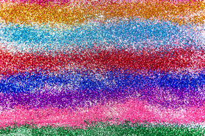 party, texture and holidays concept - multicolored glitters or sequins background