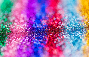 party, texture and holidays concept - multicolored glitters or sequins background
