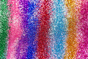 party, texture and holidays concept - multicolored glitters or sequins background