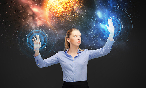 business, future technology and augmented reality concept - businesswoman with virtual planet and space hologram