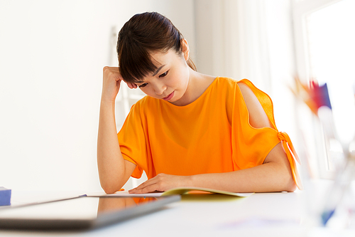 education, technology and people concept - asian student girl with tablet pc computer learning at home