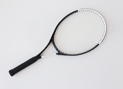 sport, fitness, healthy lifestyle and objects concept - tennis racket