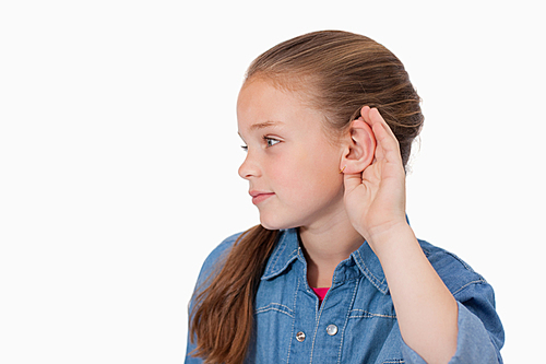 Cute girl pricking up her ear