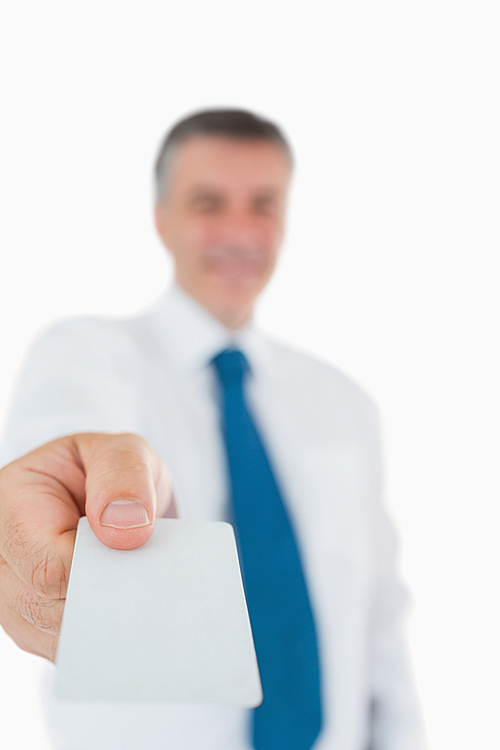 Businessman handing out card