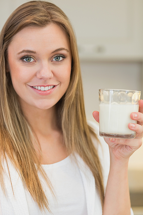 Woman drinking glass of milk