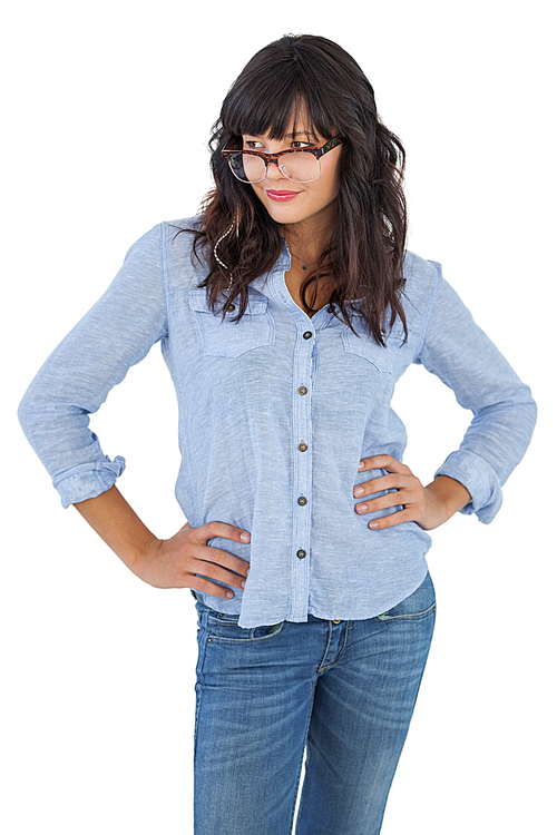 Beautiful woman with her hands on hips and wearing glasses