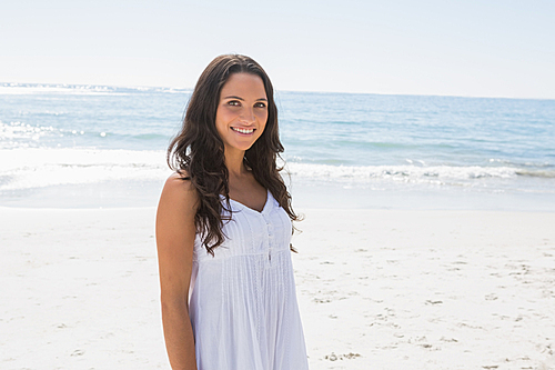 Content brunette in white sun dress 