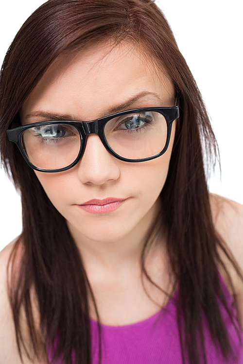 Close up on pretty brunette with glasses posing