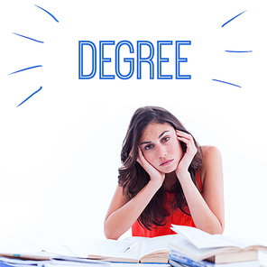 Degree against stressed student at desk