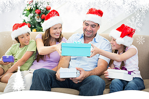 Composite image of family exchanging christmas gifts