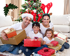 Happy family celebrating christmas at home