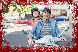 Happy mature couple riding a scooter in the city