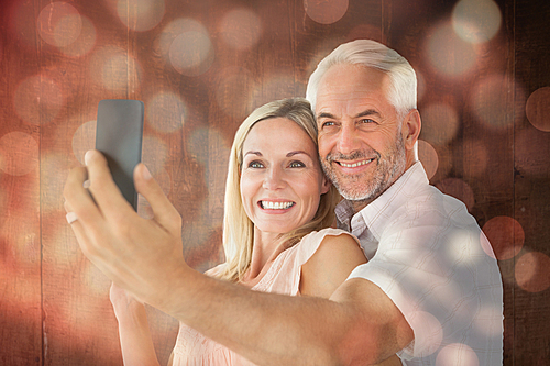 Composite image of happy couple posing for a selfie | 유토이미지 | 상세페이지 ...