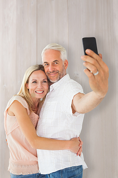 Composite image of happy couple posing for a selfie | 유토이미지 | 상세페이지 ...
