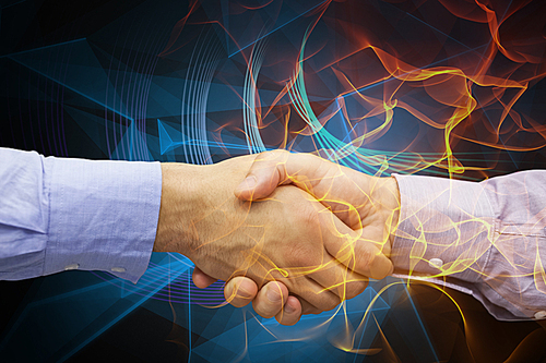 Composite image of hand shake in front of wires