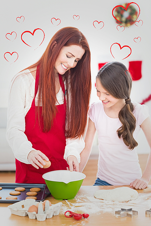 Composite image of festive mother and daughter baking together
