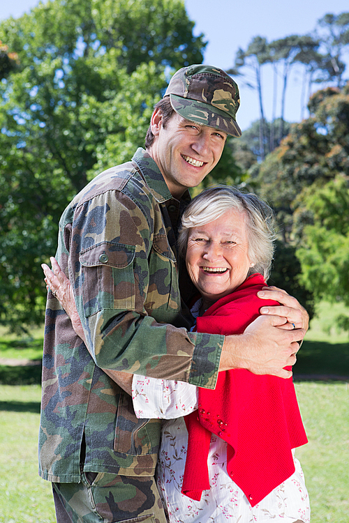 Soldier reunited with his mother on a sunny day